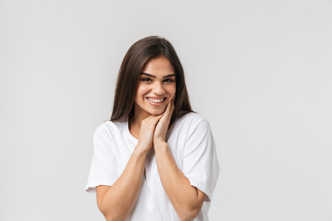 Young Woman in White Smiling